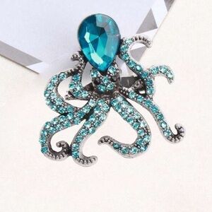 Elegant Silver and Blue Octopus Brooch